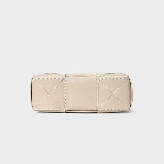 Beige Woven Leather Bucket Shoulder Bag | Effortless Quiet Luxury