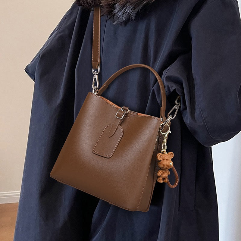 Coffee Genuine Leather Bucket Bag | Refined Bear Charm Detail